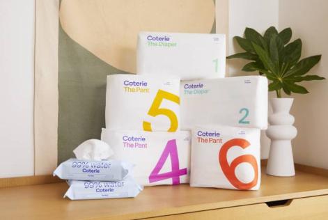 Coterie Diapers, Pants, and Wipes, stacked together.