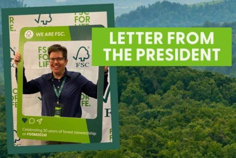 Sarah Billig, FSC US President, holding "We are FSC" sign and smiling.