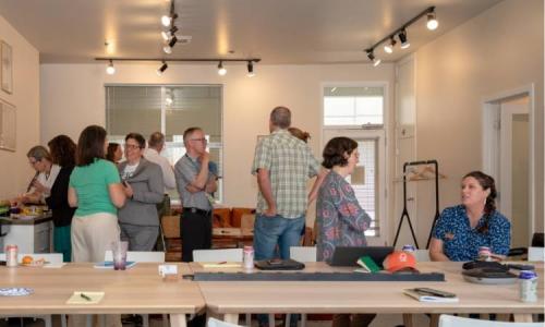 Attendees mingle and chat during an FSC networking session.