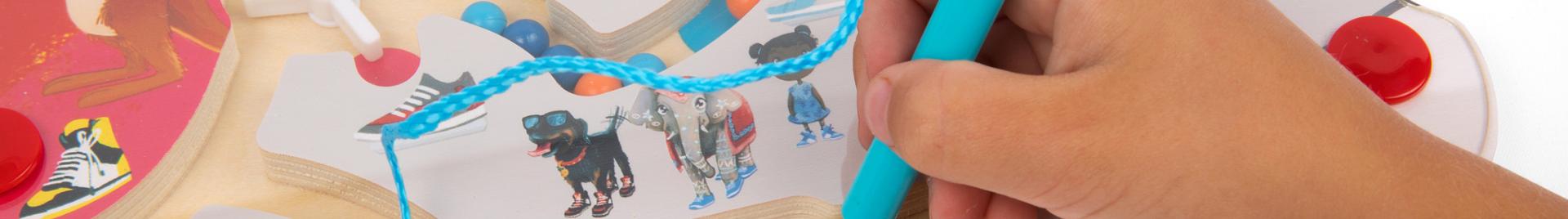 child playing with wooden toy puzzle